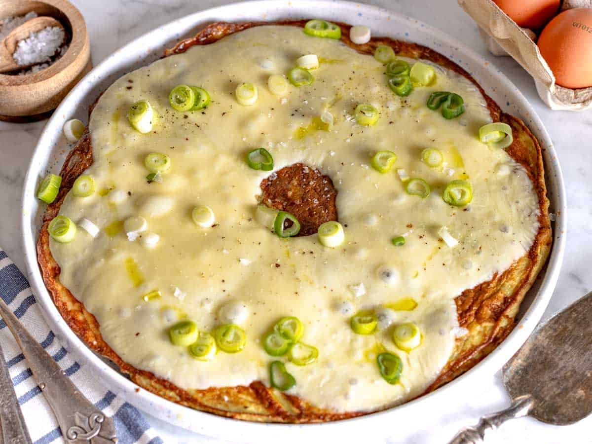 Frittata with melted provolone cheese and spring onions