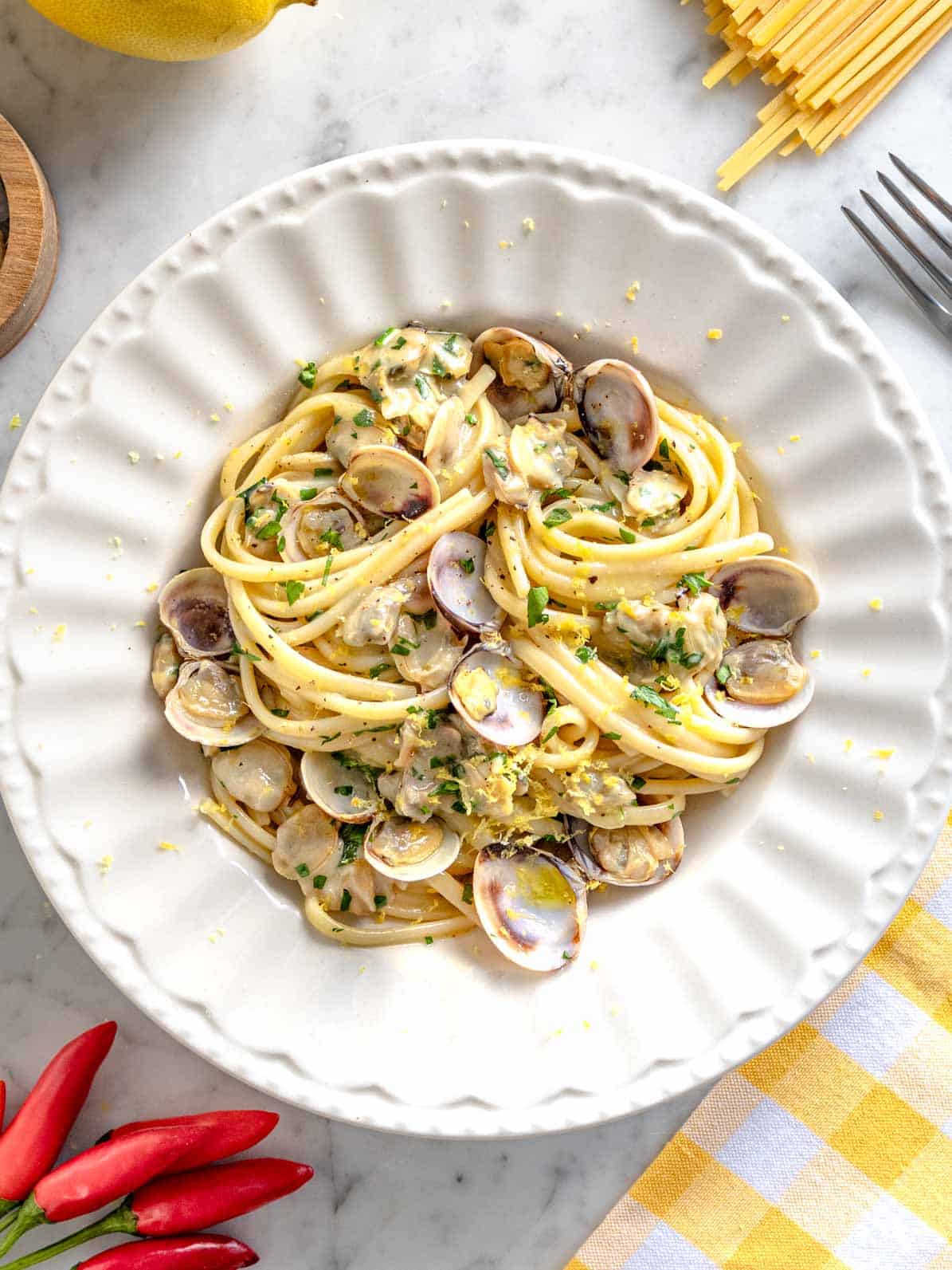 Linguine with clam sauce on a white plate