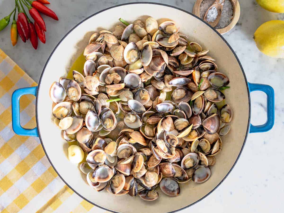 clams in a blue skillet