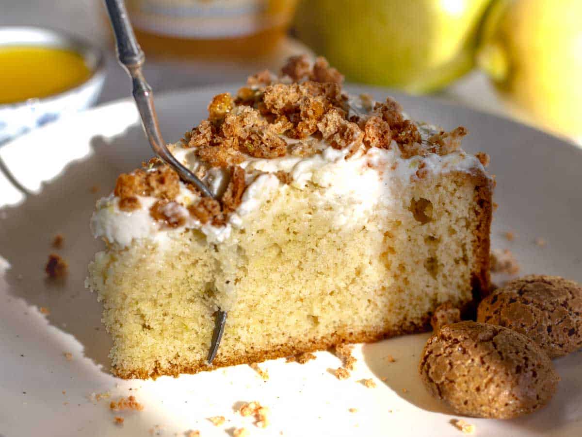 olive oil cake slice with a silver fork