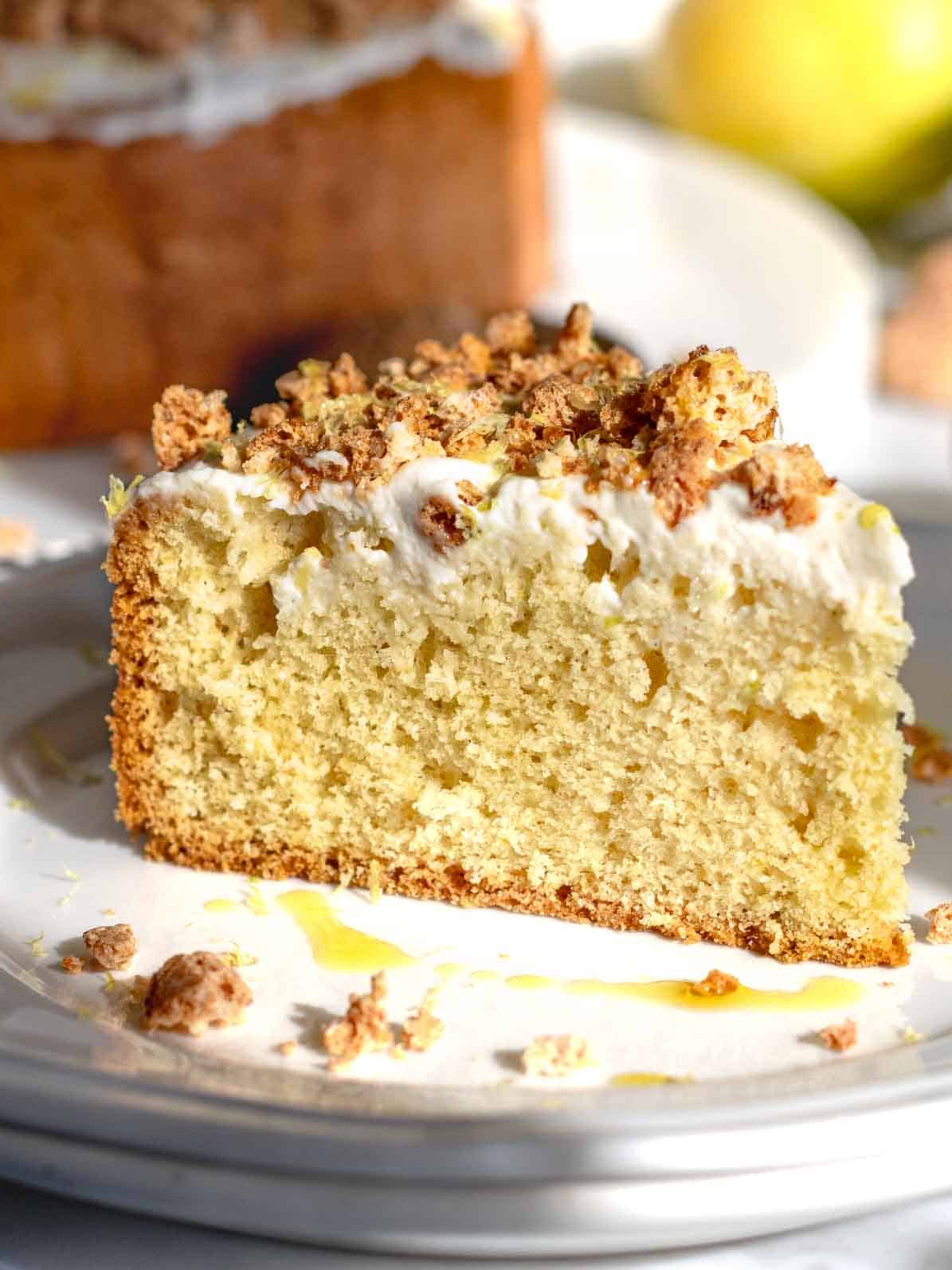 slice of olive oil cake with crushed amaretti cookies