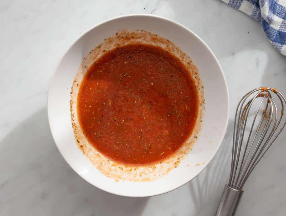 Step 1 mixing sauce whisking Mediterranean stir fry sauce in a small bowl.