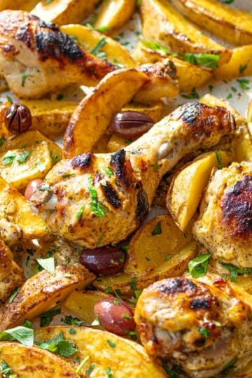 Easy Greek Lemon Chicken and Potatoes on a sheet pan for an easy Mediterranean dinner.