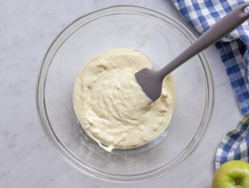 Step 1 Whisking Greek yogurt dressing for Chicken Waldorf Salad.