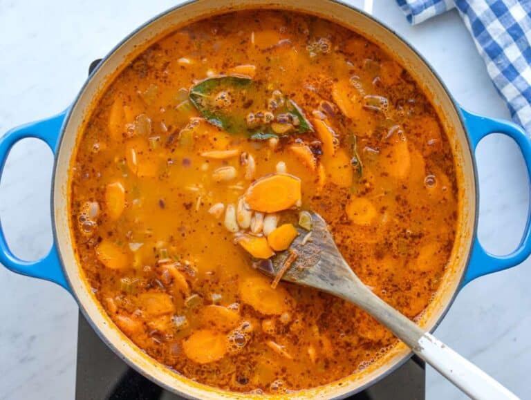 Step 3 Simmering basmati rice gently in the stew until tender and creamy.