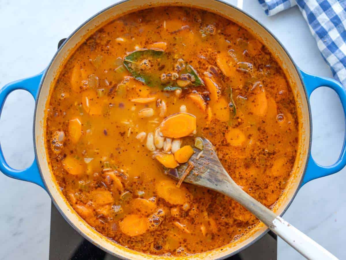 Step 3 Simmering basmati rice gently in the stew until tender and creamy.