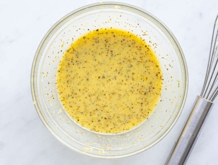 Step 3 Whisking lemon mustard dressing for Mediterranean salmon orzo