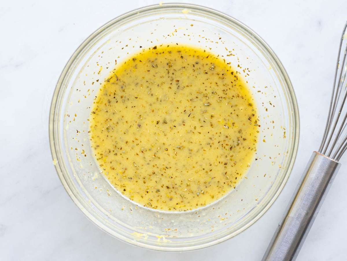 Step 3 Whisking lemon mustard dressing for Mediterranean salmon orzo