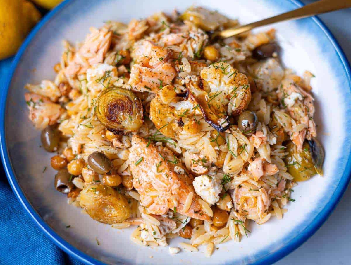 Step 5 Finished salmon orzo served warm with feta dill and lemon.