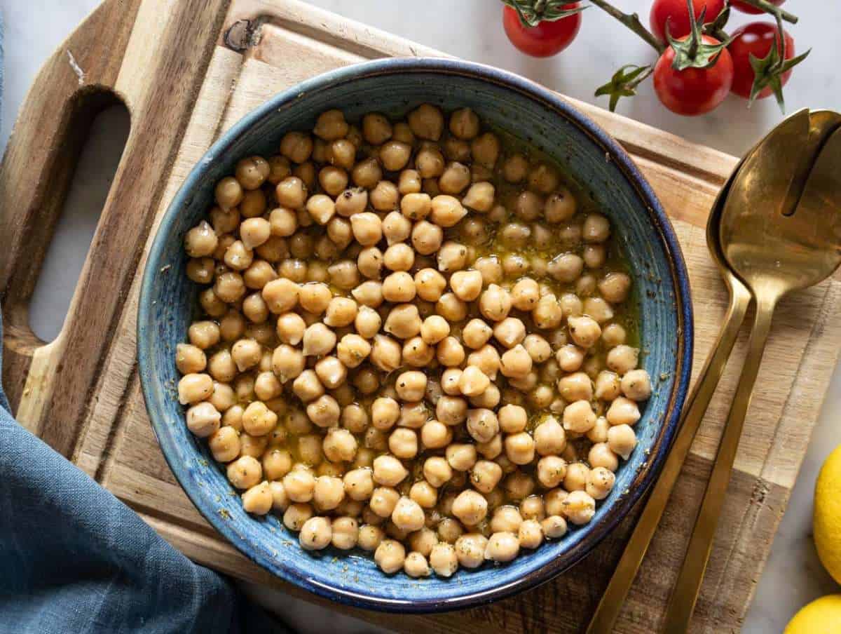 Chickpeas marinating in lemon dressing.