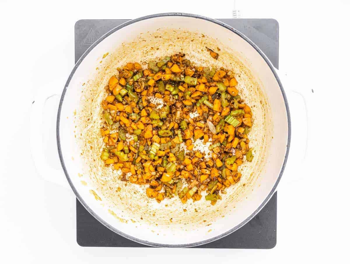 Step 1 Chopped onion carrots and celery cooking in olive oil.