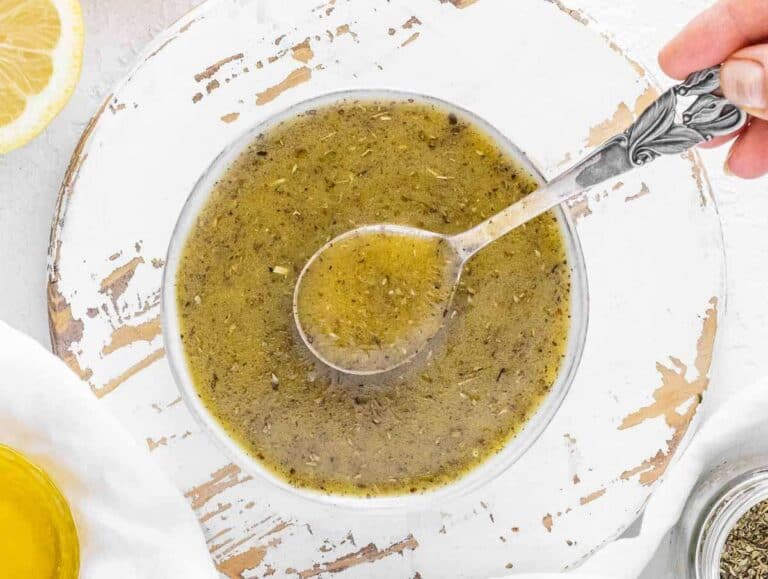 Step 1 Olive oil, lemon juice, mustard, and oregano whisked in small mixing bowl.