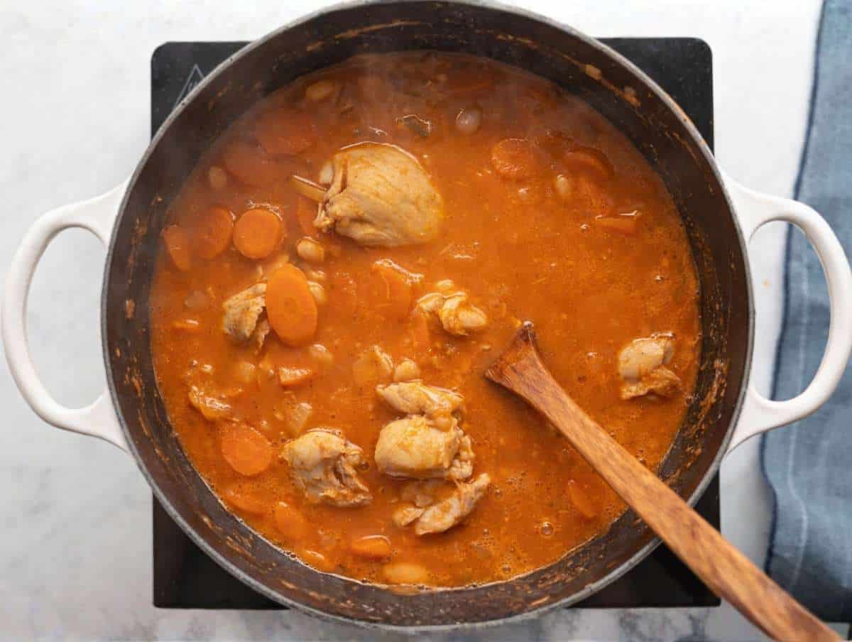 Step 3 White beans blended until smooth in a blender and added to the soup for a creamy texture.