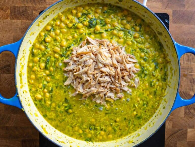 Step 4 Shredded chicken folded into turmeric rice.