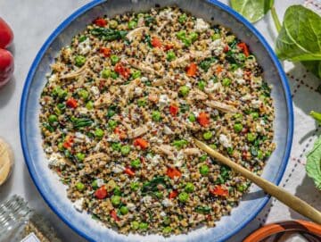 Step 4 The final chicken quinoa bowl being tossed together until the eggs look silky and set.