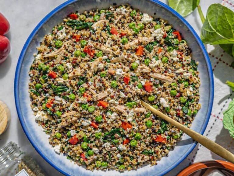 Step 4 The final chicken quinoa bowl being tossed together until the eggs look silky and set.