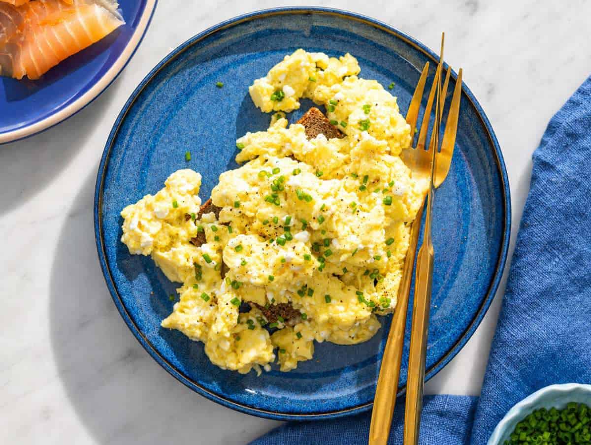 Step 3 Soft scrambled cottage cheese eggs served on rye bread.