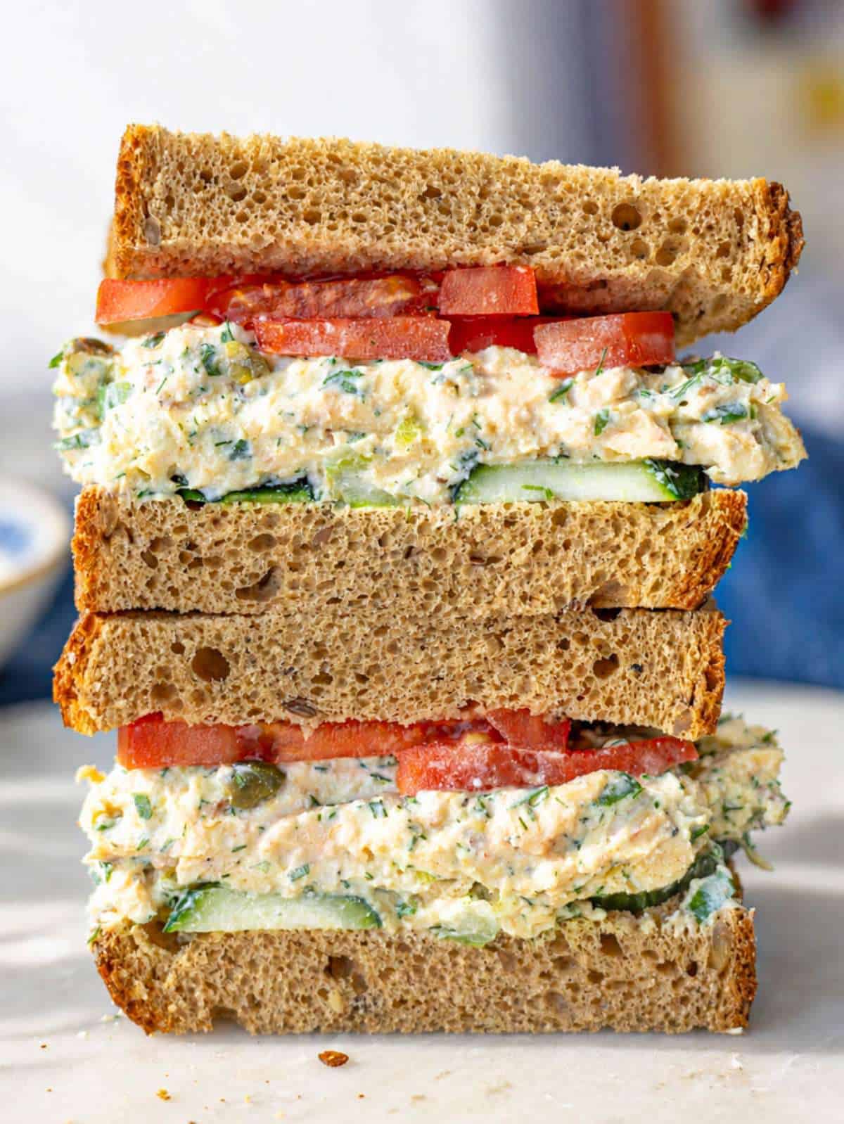 Cottage cheese chicken salad sandwich stacked high with creamy filling and fresh vegetables.