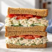 Cottage cheese chicken salad sandwich with thick creamy filling and crunchy cucumber slices.