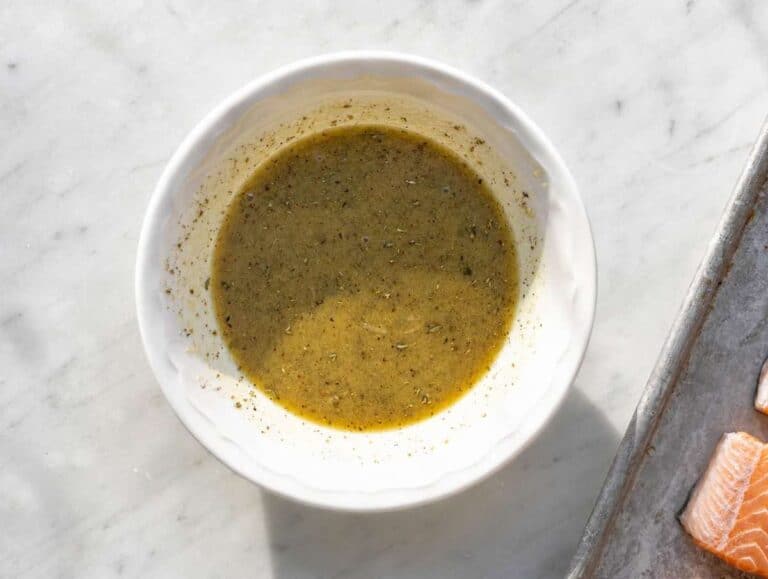 STEP 2 Honey mustard lemon sauce whisked in a small bowl near window light.