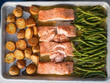 STEP 4 Fully roasted and flaky salmon and vegetables fresh from the oven.