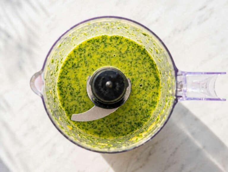 Step 1 Cilantro lime dressing in a blender with natural light from a kitchen window.