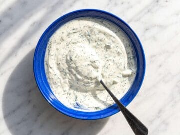 Step 2 Greek yogurt dressing whisked in a bowl.
