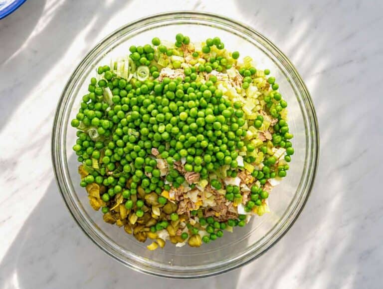 Step 3 Tuna, pasta, eggs, peas, and celery in a large bowl.
