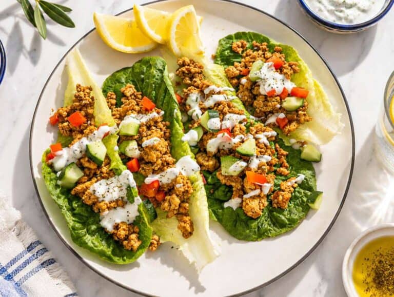 Step 4 Lettuce leaves filled with turkey, cucumber, and creamy yogurt sauce.