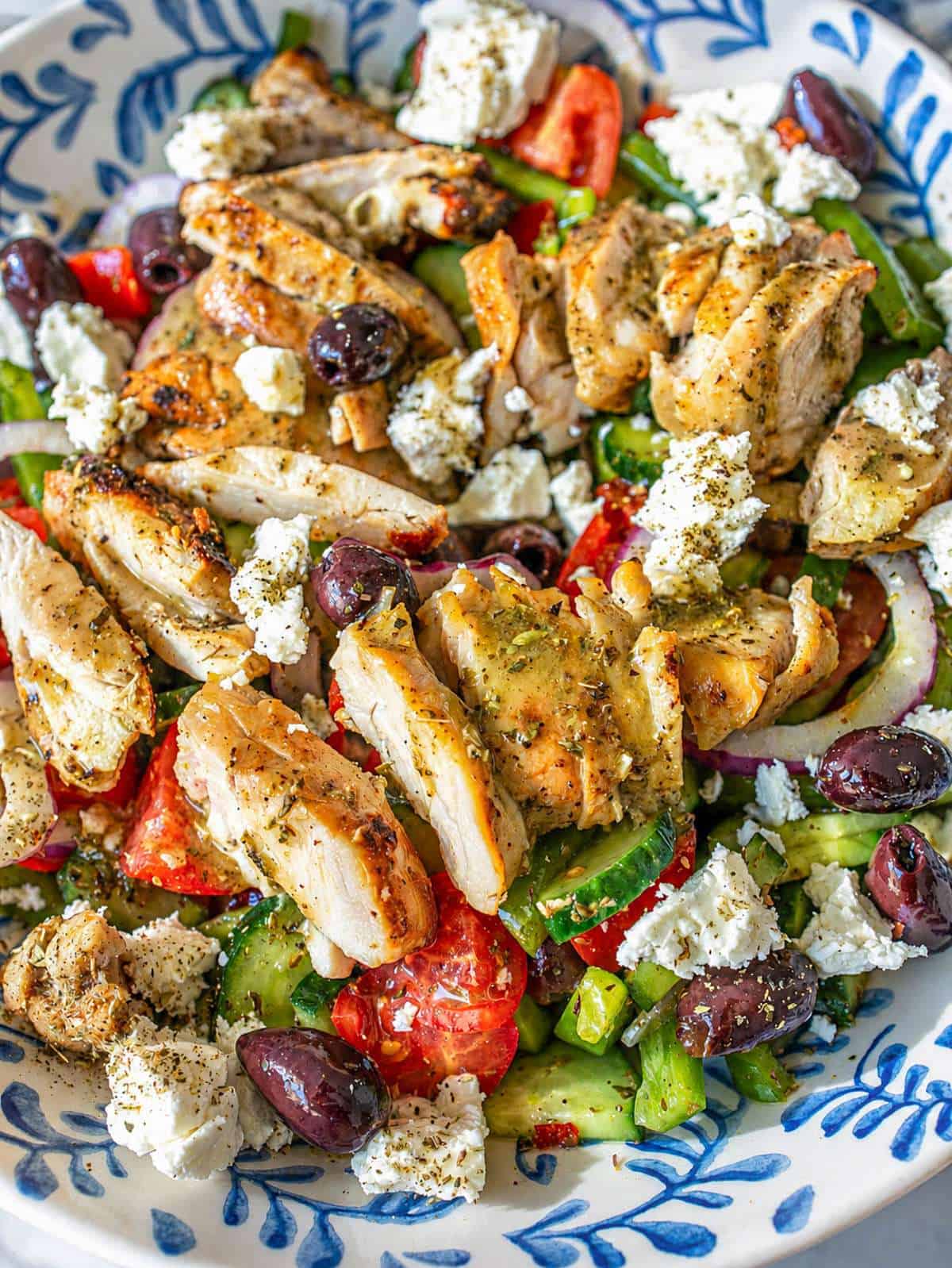 Greek Grilled Chicken Salad with feta, olives, and sliced chicken.