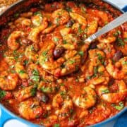 Mediterranean shrimp skillet with olives and parsley.