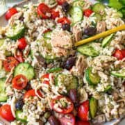 Mediterranean tuna rice salad in serving bowl.