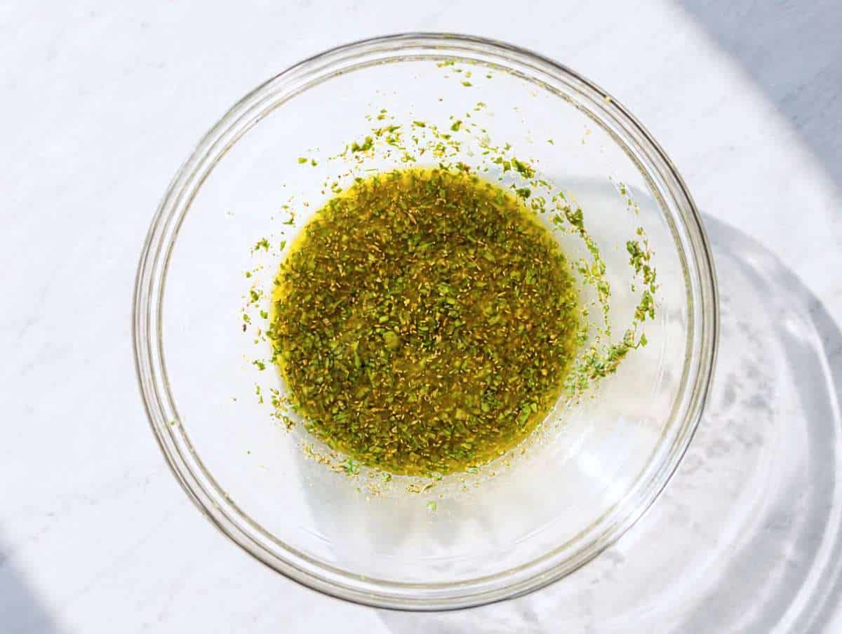 Step 2 Lemon oregano dressing whisked in large bowl.