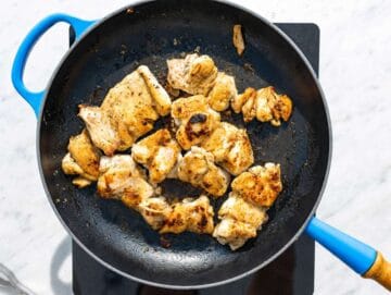 Step 3 Marinated chicken grilling with char marks forming on surface.
