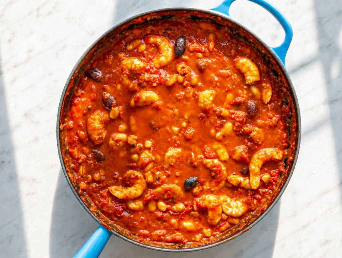 Step 3 Shrimp cooking in puttanesca sauce.