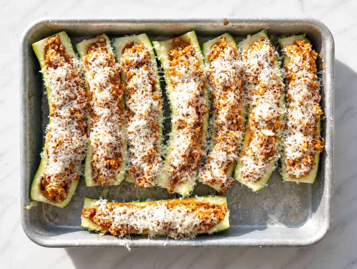 Step 3 Zucchini halves generously filled with turkey mixture and topped with Parmesan.